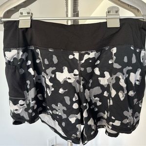 Athleta black print shorts with pocket size M